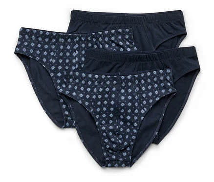 Trois slips pour hommes bleu marine sont superposés, dont deux avec un motif floral bleu.