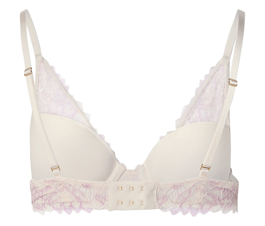 Gros plan d'un soutien-gorge blanc avec de la dentelle rose, vu de dos.