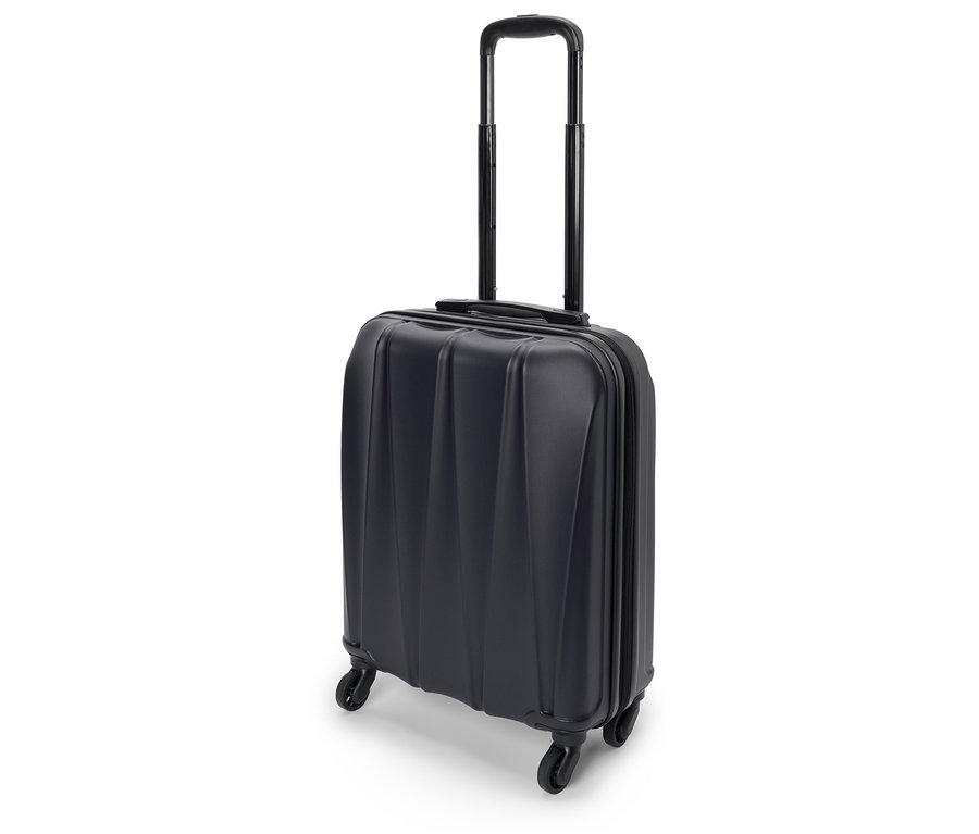 Valise bleu foncé à roulettes avec poignée extensible sur fond blanc.