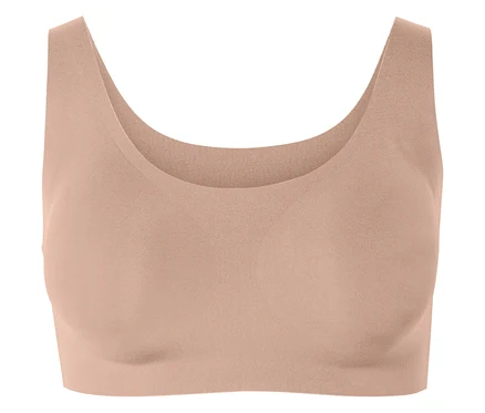 Soutien-gorge de sport couleur pêche.