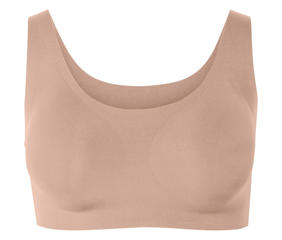 Soutien-gorge de sport couleur pêche.