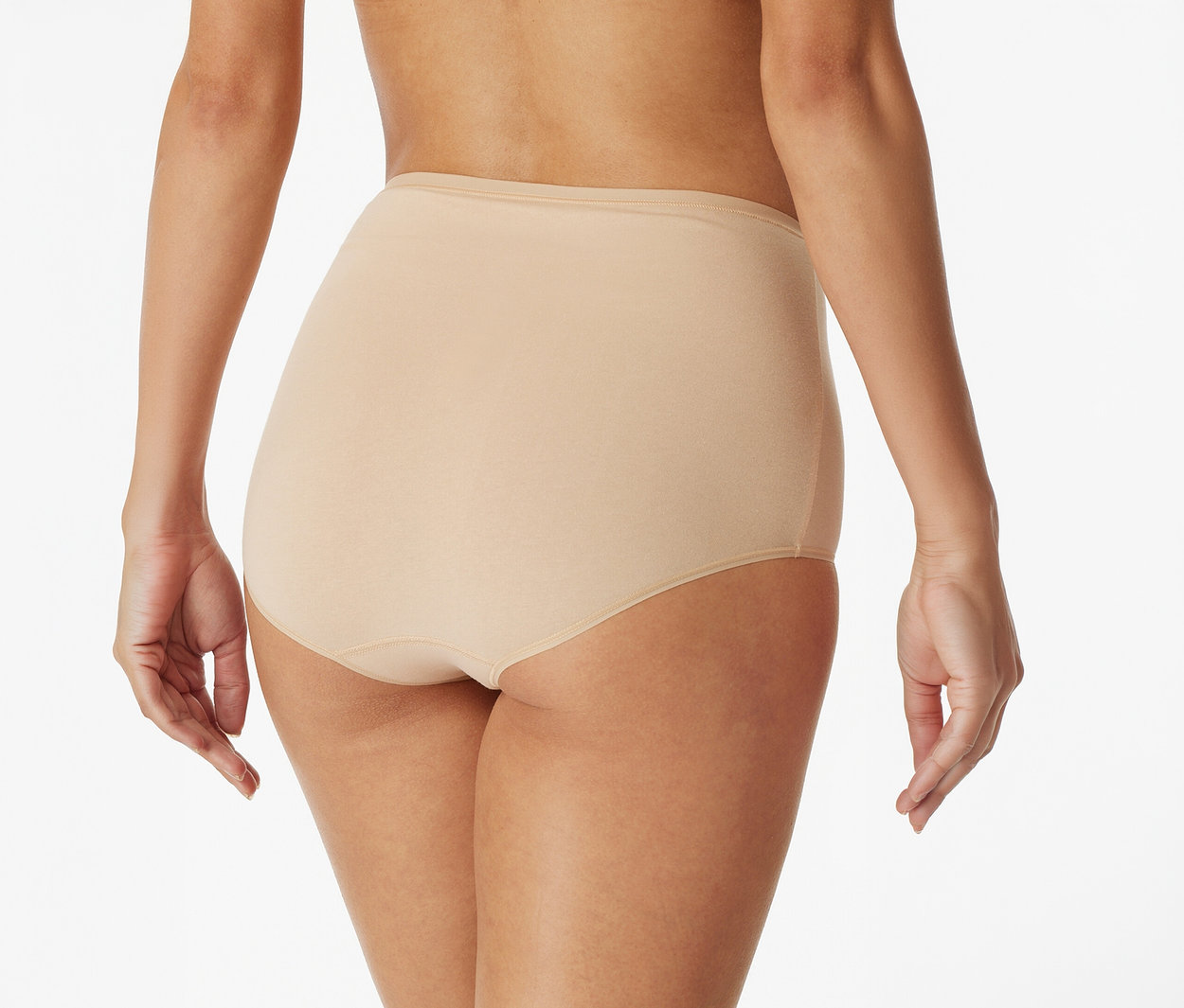 Vue de dos d'une personne portant une culotte taille haute beige.