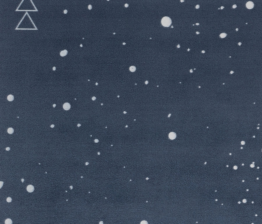 Surface bleu foncé avec des points blancs et deux triangles dans le coin supérieur gauche.