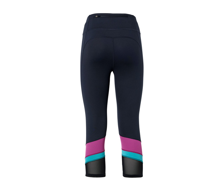 Un corsaire de sport bleu marine avec des détails violets, turquoise et noirs sur les jambes.