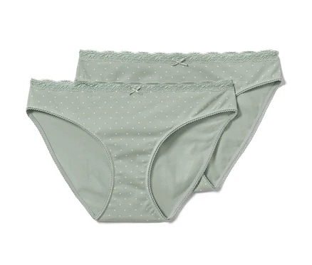 Deux slips verts à pois blancs.