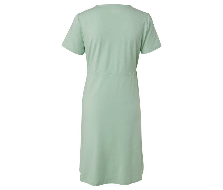 Vue arrière d'une chemise de nuit vert clair.