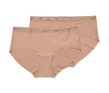 Deux slips Magic Cut beiges sont posés l'un sur l'autre.