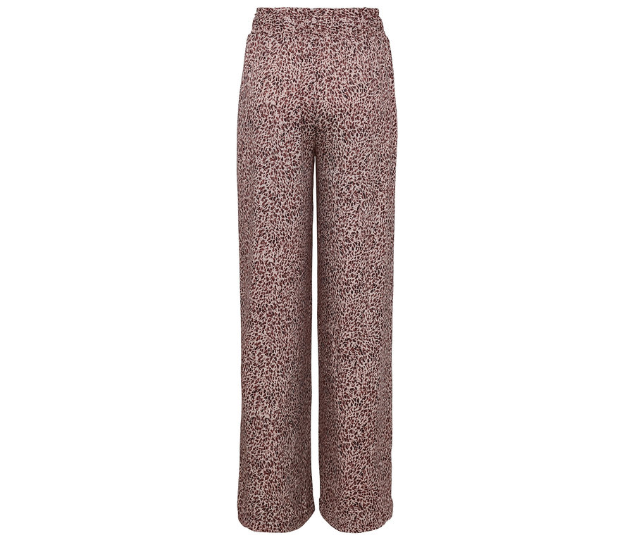 Pantalon beige à motif animalier.