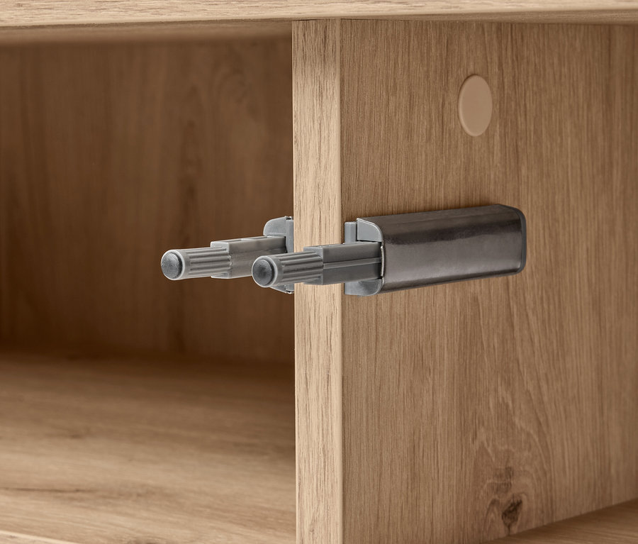 Détail du sideboard REET montrant un gros plan du mécanisme.