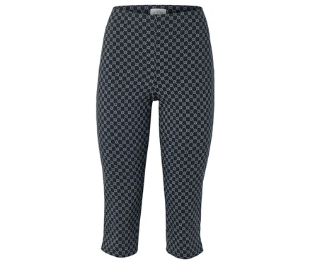 Un pantalon capri bleu marine avec un motif géométrique blanc répétitif.