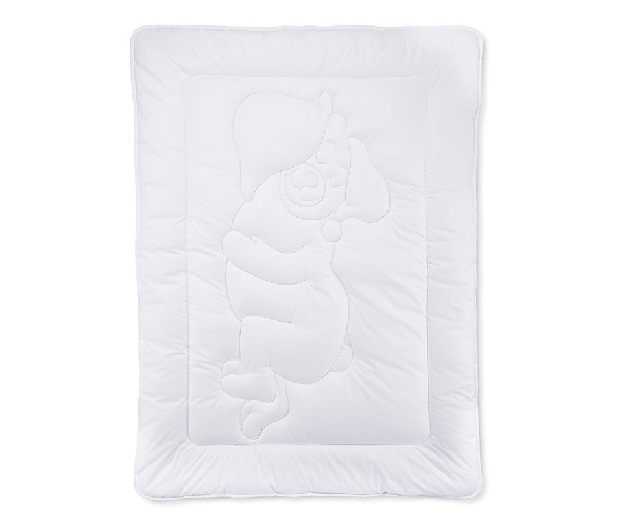 Couette et oreiller blanc pour enfant avec un motif d'ours en relief.