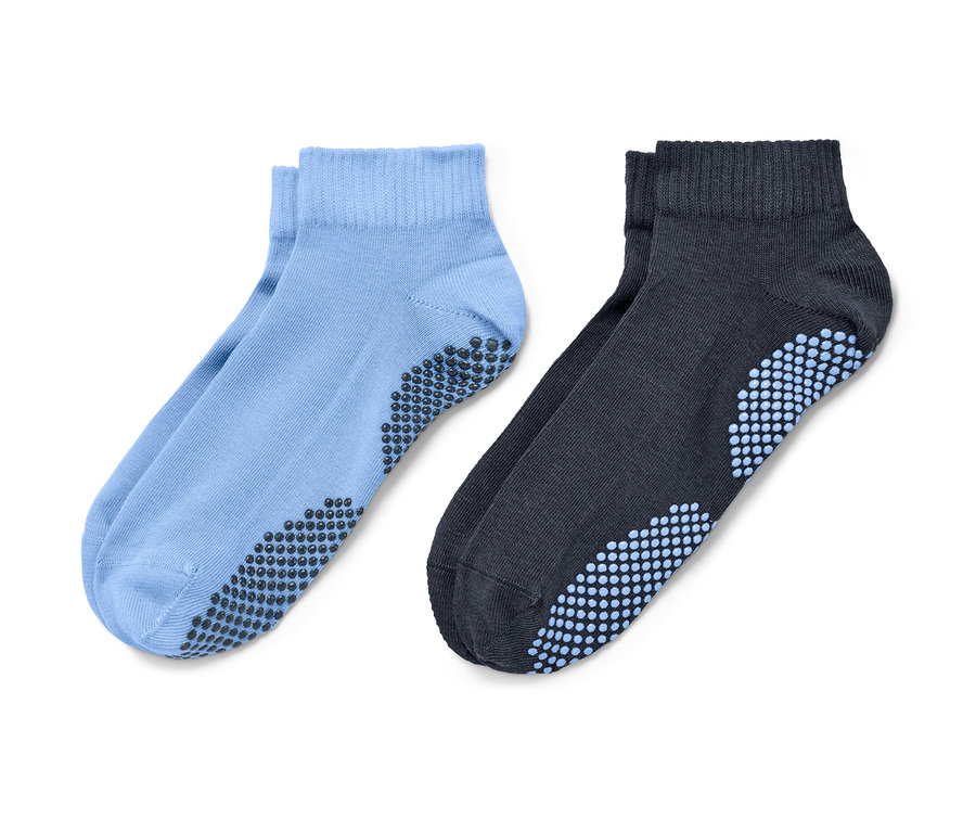 Deux paires de chaussettes de yoga : bleu clair et bleu foncé.