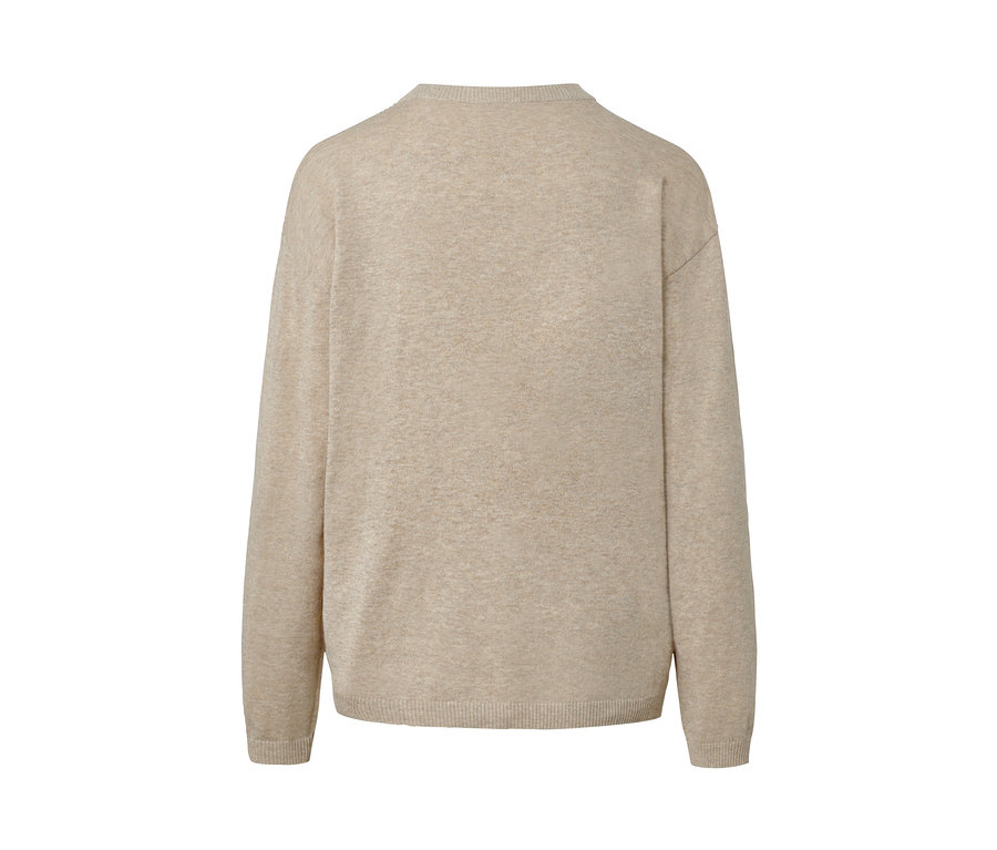 Vue détaillée d'un pull en tricot fin avec détail nervuré, beige.