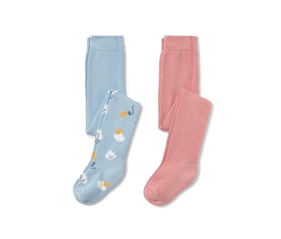 Deux collants pour tout-petits : un bleu clair avec des motifs de nuages, de soleil et de cerf-volant, l’autre rose.
