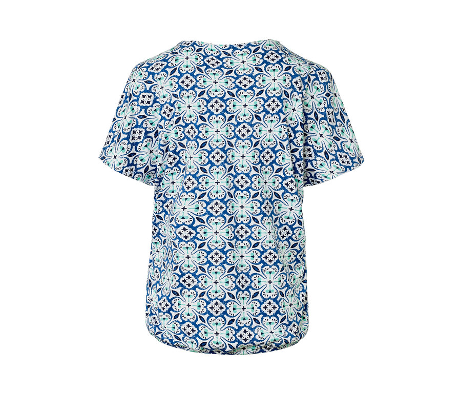 Vue arrière d'une blouse avec imprimé intégral.