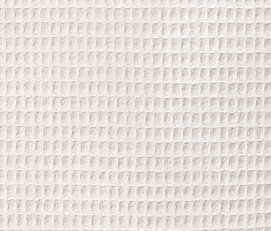 Gros plan sur un peignoir pour femme avec une texture gaufrée.