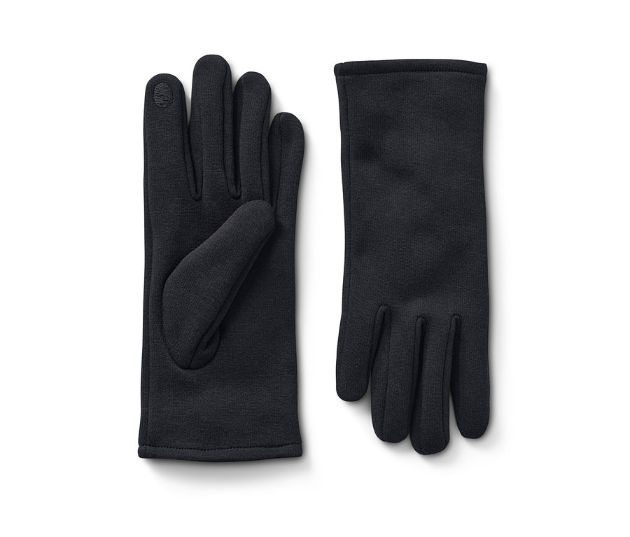 Deux gants en sweat noirs sont posés l'un à côté de l'autre.