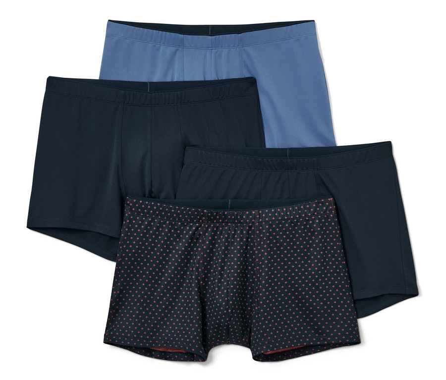 Quatre boxers : un bleu clair, trois bleu foncé, un à motifs.