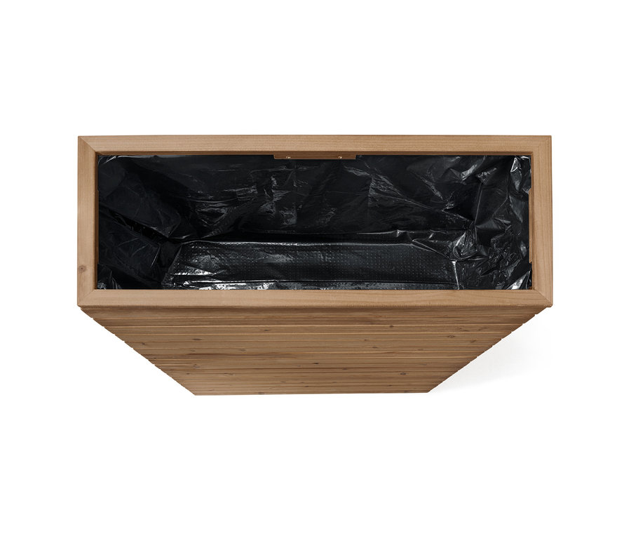 Vue de dessus de la cloison pour bacs à plantes « Tinus » vide avec insert noir.