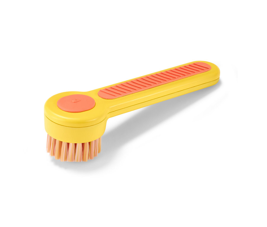 Brosse à chaussures jaune.
