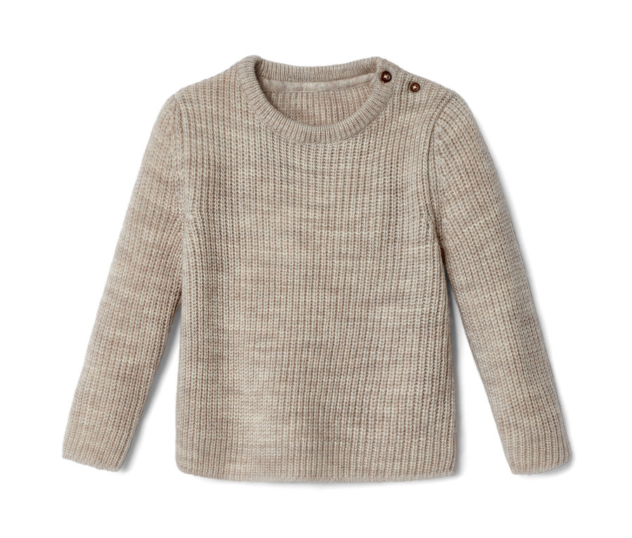 Un pull en laine beige pour enfant avec des boutons sur l'épaule.