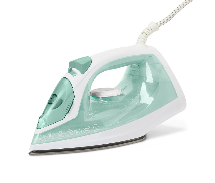 Un fer à repasser à vapeur blanc et vert clair.