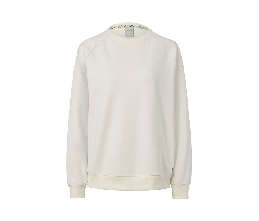 Détail d'un sweat-shirt de yoga blanc naturel.