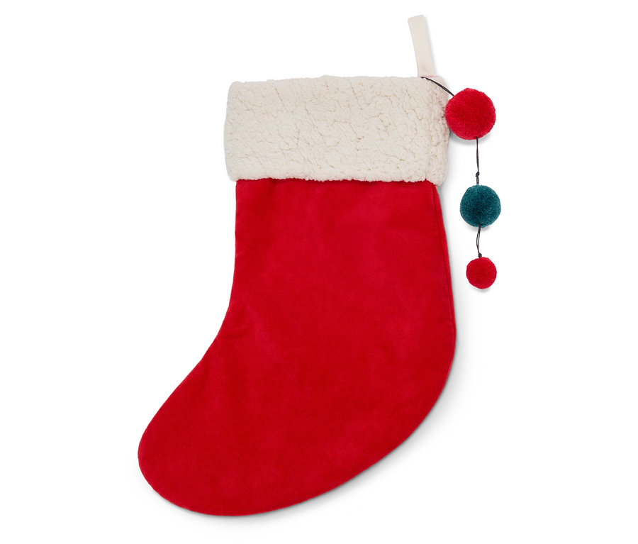 Chaussette de Noël rouge avec fausse fourrure blanche et décorations à pompons.