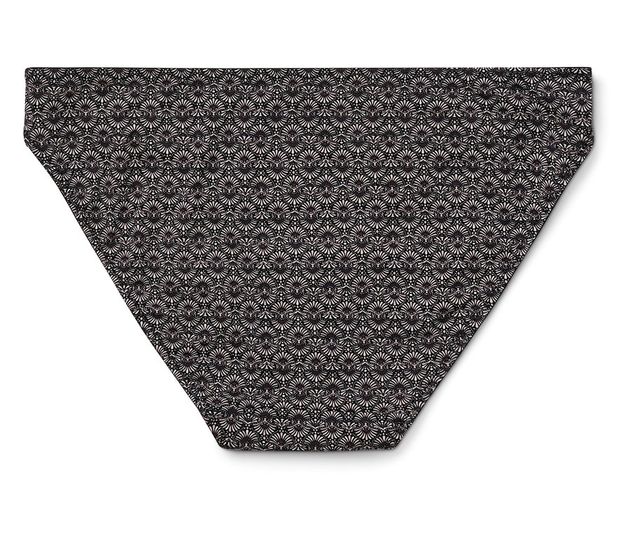 Bas de bikini à motif floral sur fond noir.