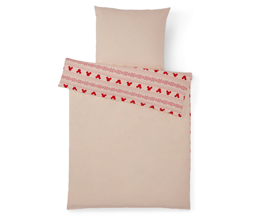 Linge de lit beige avec motif Mickey Mouse rouge.