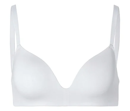 Soutien-gorge blanc avec de fines bretelles et un décolleté en V sur fond blanc.
