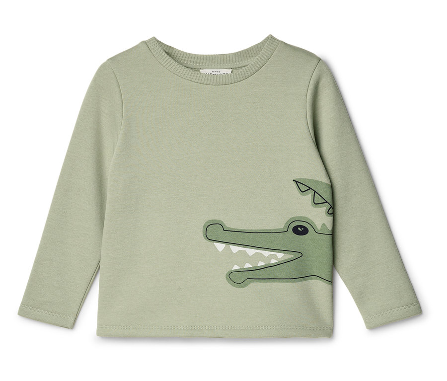 T-shirt vert à manches longues avec un motif de crocodile.