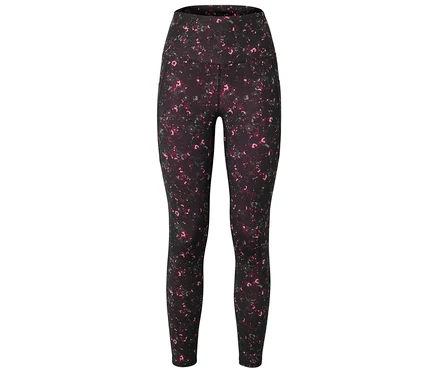 On voit un legging noir à taille haute avec un motif de taches roses et grises.