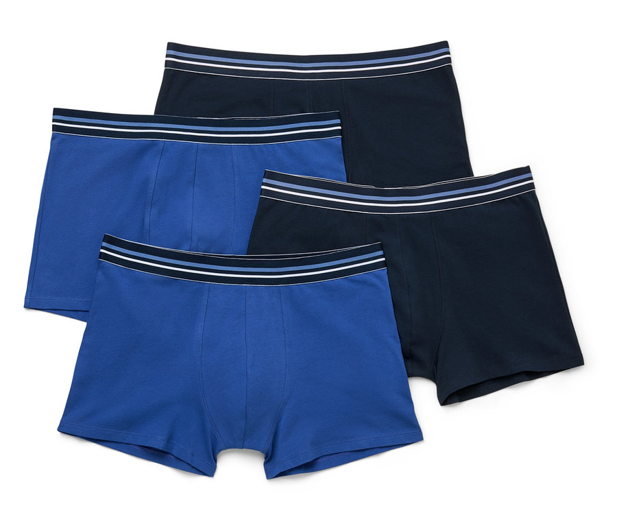 Quatre boxers, deux bleu roi et deux bleu marine, avec des ceintures rayées, sont empilés.