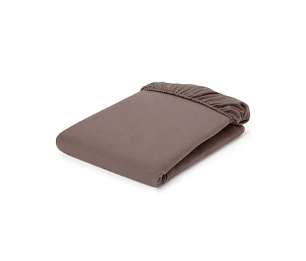 Drap-housse marron plié avec le bord élastique visible.