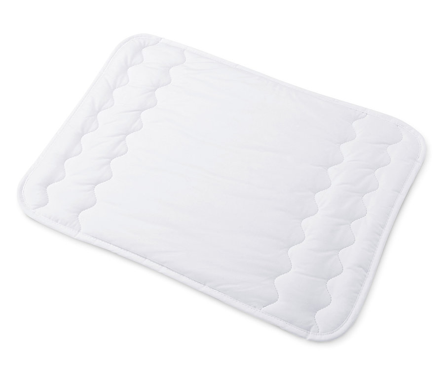 Une couette et oreiller enfant blanc.