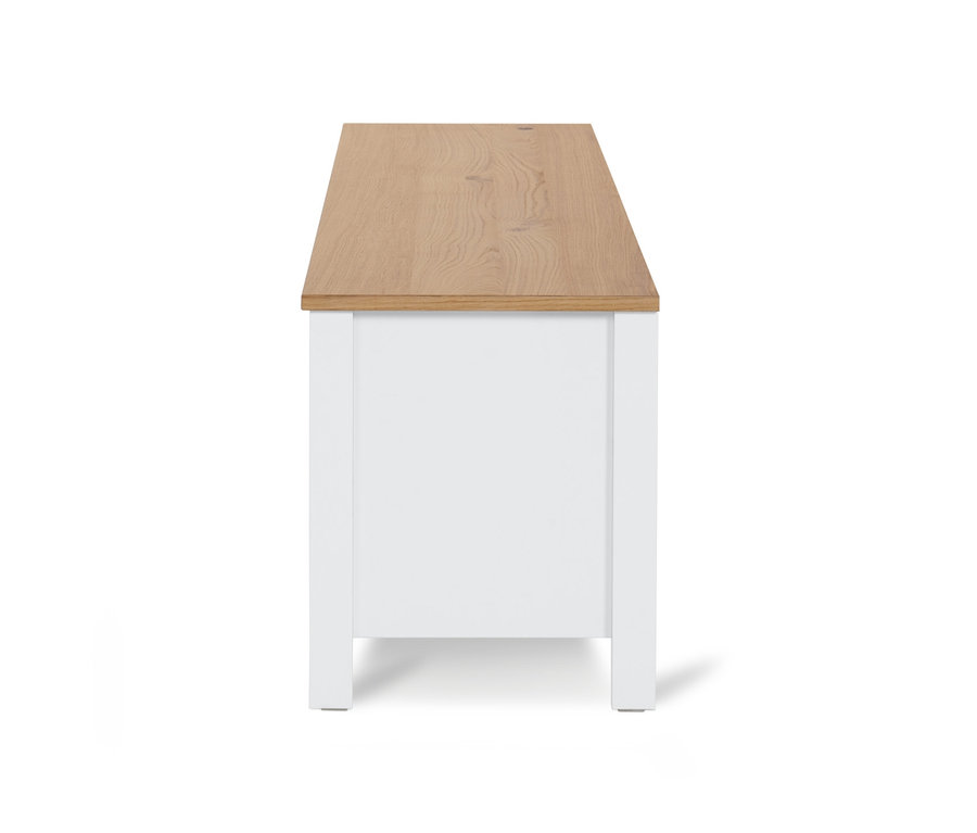 Vue latérale d'un meuble TV »Clara« avec un cadre blanc et un plateau en bois clair.