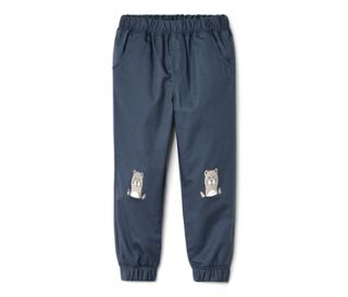 Bleu moyen avec imprimé de loutre sur le genou