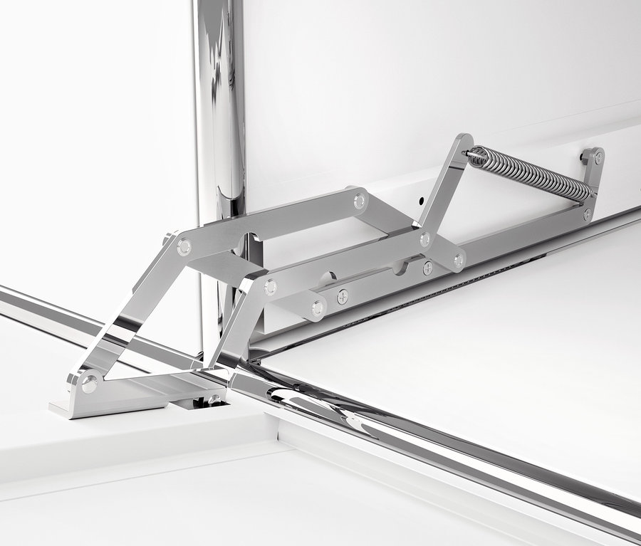 Détail d'un meuble en métal blanc CN3 avec abattants et mécanisme en métal.