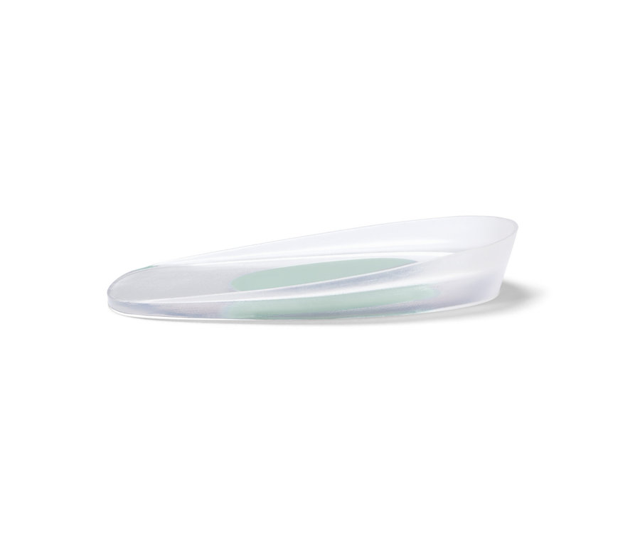 Une paire de talonnettes transparentes sur fond blanc.