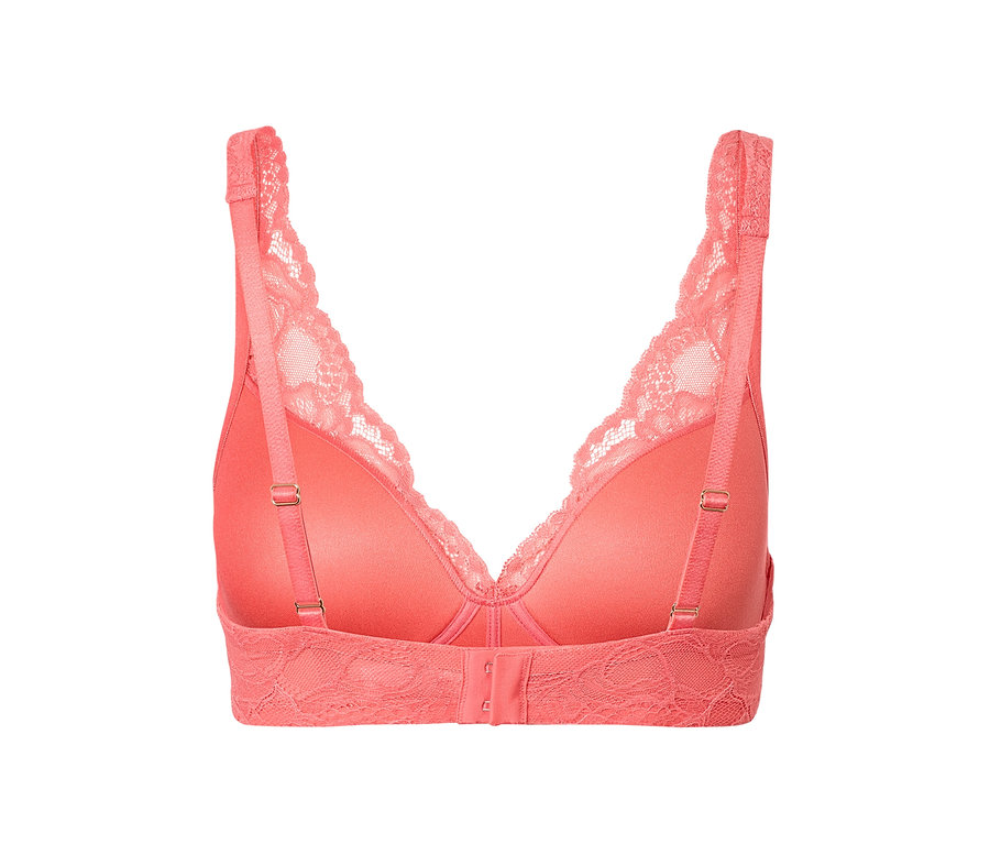 Détail du dos d'un soutien-gorge à coques souples couleur papaye avec détails en dentelle.