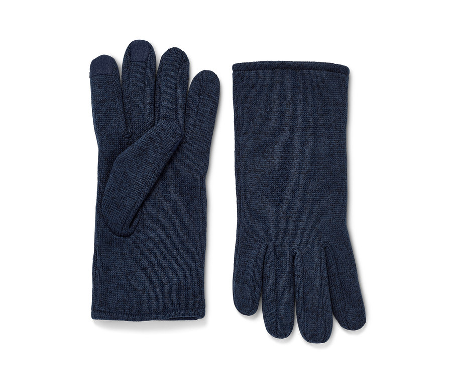 Deux gants en polaire tricotée bleu foncé sont posés l'un à côté de l'autre.