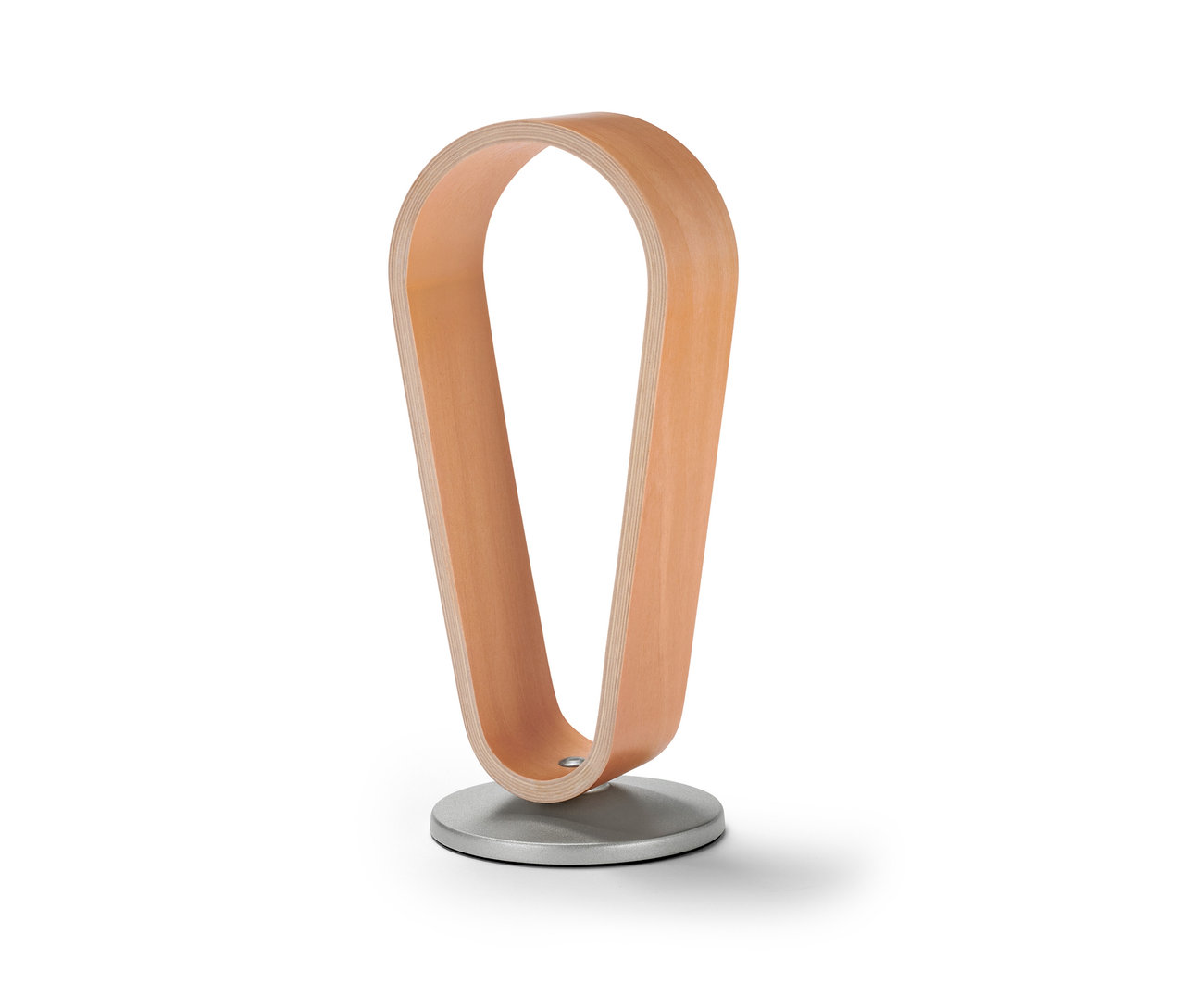 Support de casque en bois clair avec une base ronde argentée.