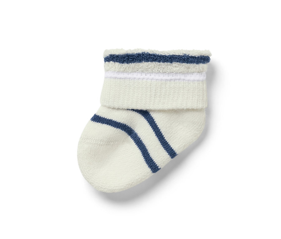 Vue détaillée d'une chaussette de bébé du lot de 7 paires de chaussettes pour bébé, dragon, avec des rayures bleues sur un fond blanc.