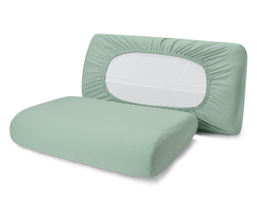 Deux taies d'oreiller vert clair, dont une avec bord élastique.