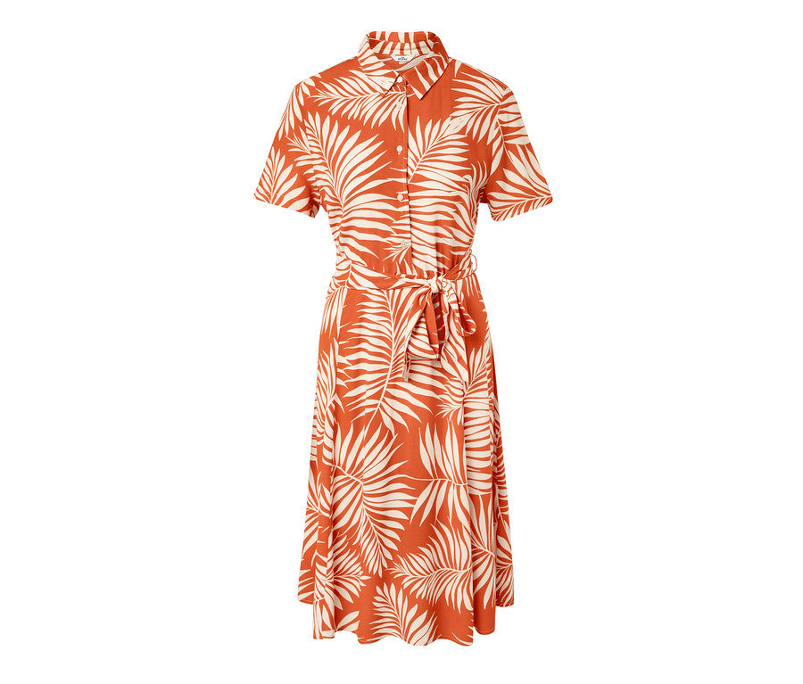 Robe chemise imprimée orange avec des feuilles et une ceinture.