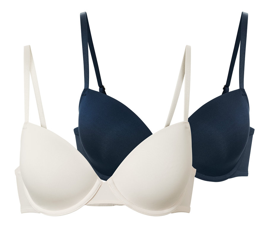 Deux soutiens-gorge à coques, un crème et un bleu marine.