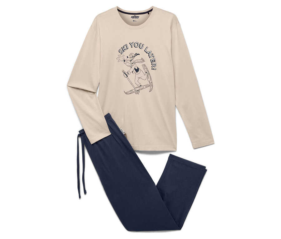Pyjama beige «
Mickey et ses amis
» composé d'un haut à manches longues avec une illustration de Goofy faisant du ski et d'un pantalon bleu marine.