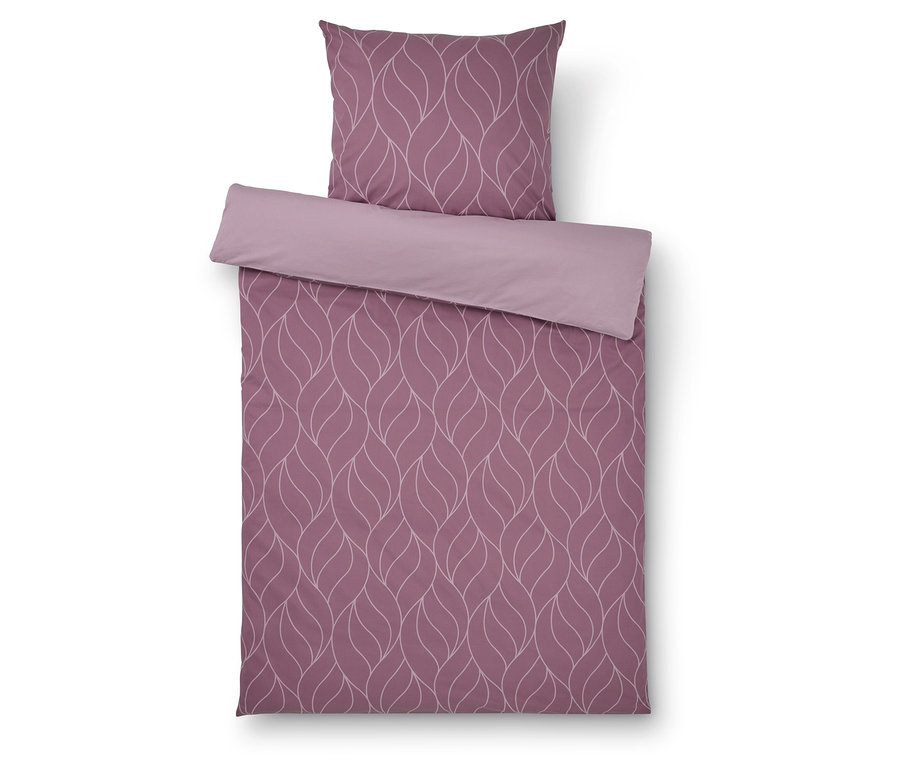 Linge de lit violet avec motif de feuilles et bordure et oreiller violet clair.