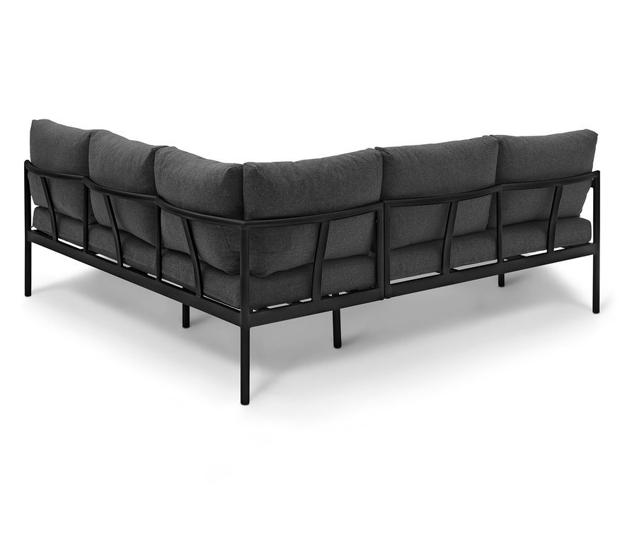 Vue arrière d'un canapé d'angle avec un cadre noir et des coussins gris.